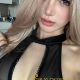 Attractive Chinese KL call girl, Fumi, in a black top.