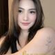 Divina, a Bukit Bintang escort, poses for a photo.