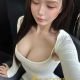Attractive Chinese KL call girl, Fumi, in a white dress.