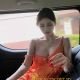 Attractive Chinese KL call girl, Fumi, in orange dress.
