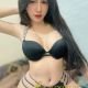 Attractive Malaysian escort girl, Maya, in lingerie.