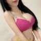 Attractive Malaysian escort girl, Maya, in pink lingerie.