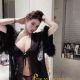 Attractive Chinese woman in black lingerie and robe.